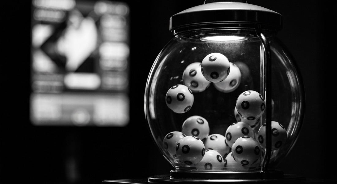 A glowing lottery and numbers game results display board